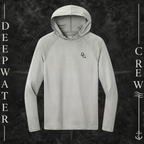 Deepwater Crew Co. Silver - DC - UPF 44+ lightweight performance hoodie. Front view of hoodie with a  deepwater crew DC logo graphic on the left chest.
