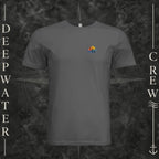 Asphalt Deepwater Crew Co. Be Salty, Stay Lit crewneck T-shirt, front view with small cross, sunset, and blue-wave crest.