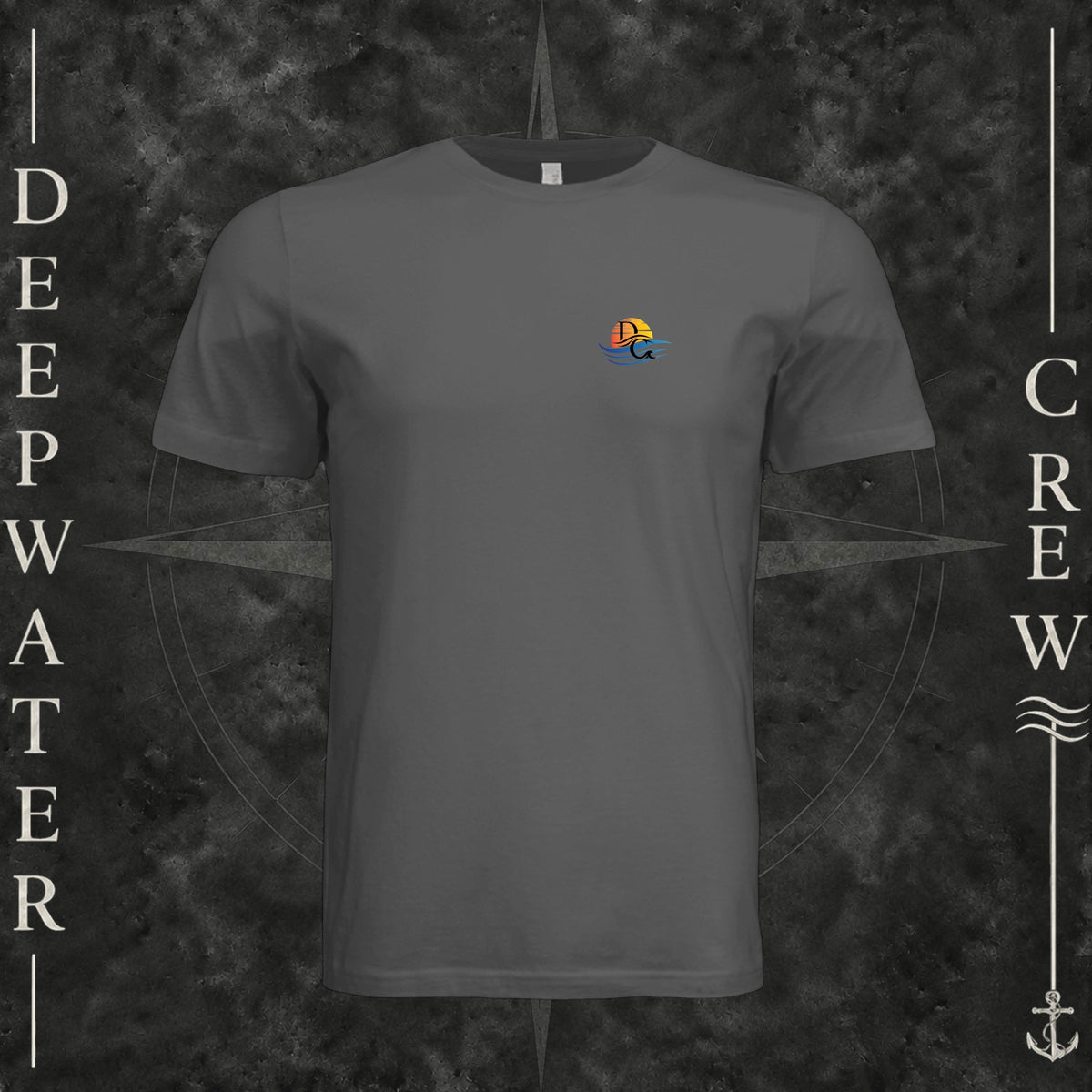 Asphalt Deepwater Crew Co. Be Salty, Stay Lit crewneck T-shirt, front view with small cross, sunset, and blue-wave crest.