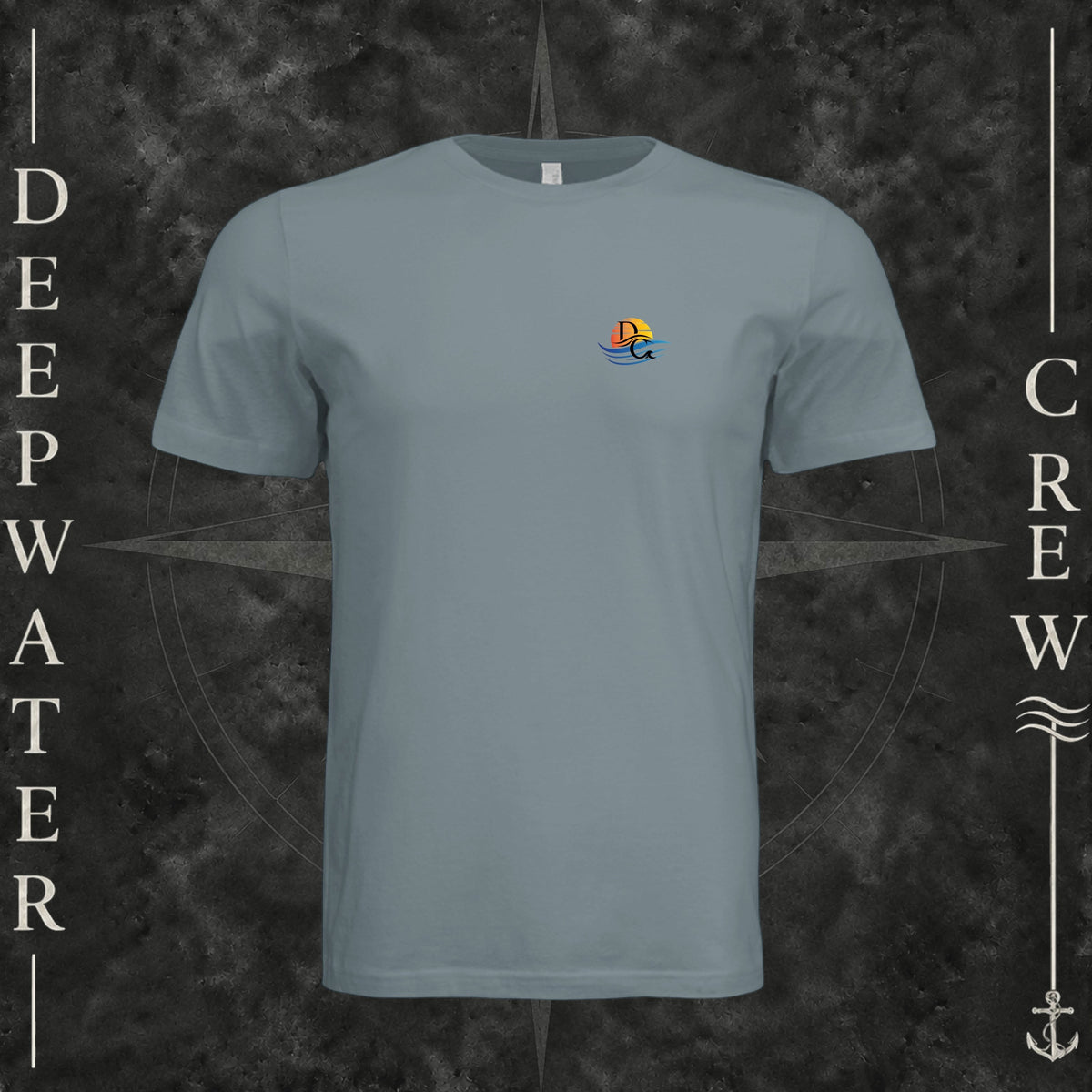 Blue Storm Deepwater Crew Co. Be Salty, Stay Lit crewneck T-shirt, front view with small cross, sunset, and blue-wave crest.
