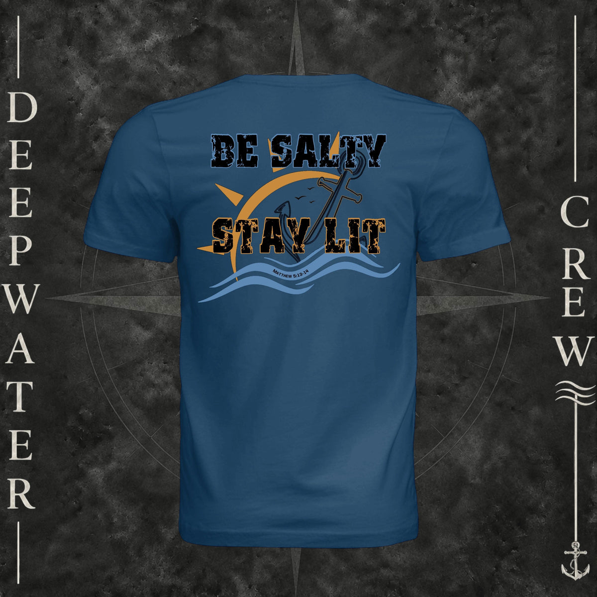Cool Blue Deepwater Crew Co. Be Salty, Stay Lit crewneck T-shirt, back view with distressed Be Salty, Stay Lit lettering, anchor, sun, blue waves, and Matthew 5:13–14.
