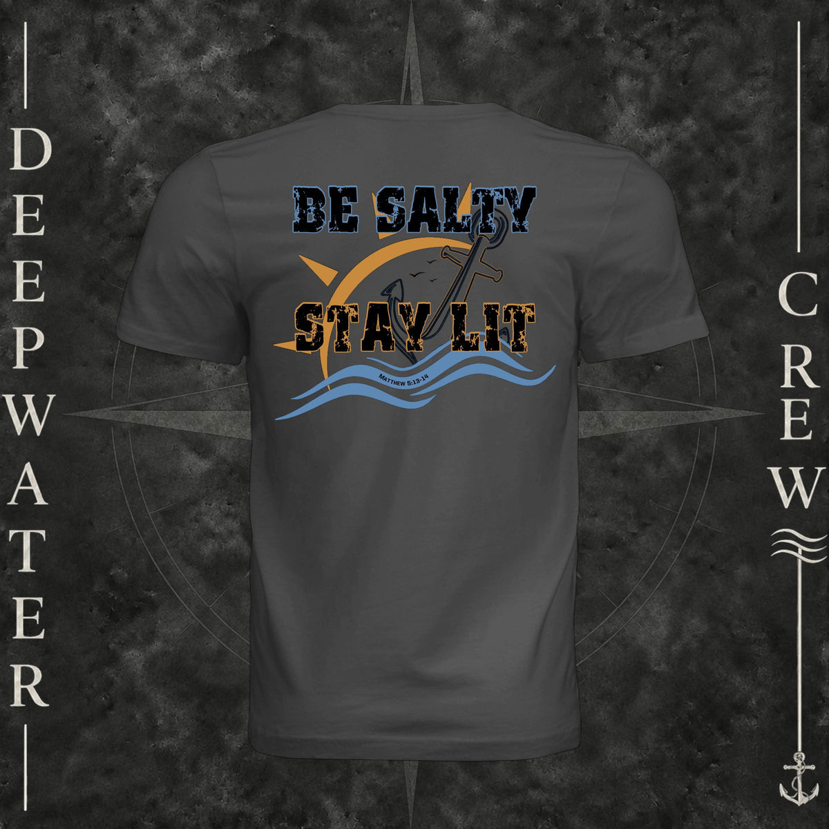 Dark Grey Deepwater Crew Co. Be Salty, Stay Lit crewneck T-shirt, back view with distressed Be Salty, Stay Lit lettering, anchor, sun, blue waves, and Matthew 5:13–14.