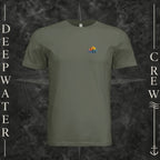 Dark Olive Deepwater Crew Co. Be Salty, Stay Lit crewneck T-shirt, front view with small cross, sunset, and blue-wave crest.