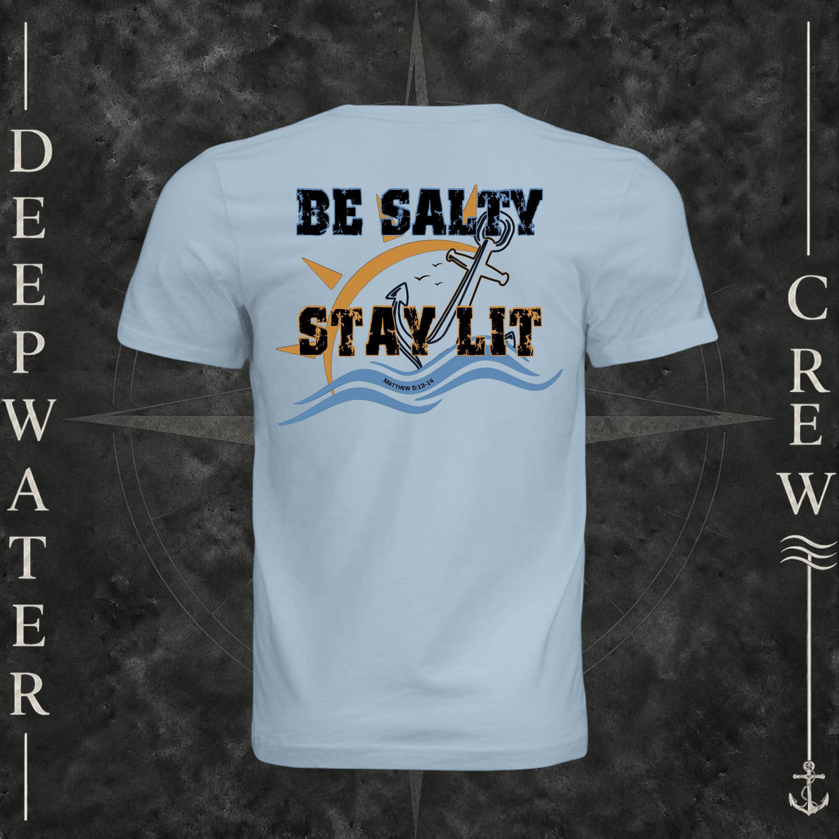 Light Blue Deepwater Crew Co. Be Salty, Stay Lit crewneck T-shirt, back view with distressed Be Salty, Stay Lit lettering, anchor, sun, blue waves, and Matthew 5:13–14.