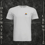 Silver Deepwater Crew Co. Be Salty, Stay Lit crewneck T-shirt, front view with small cross, sunset, and blue-wave crest.