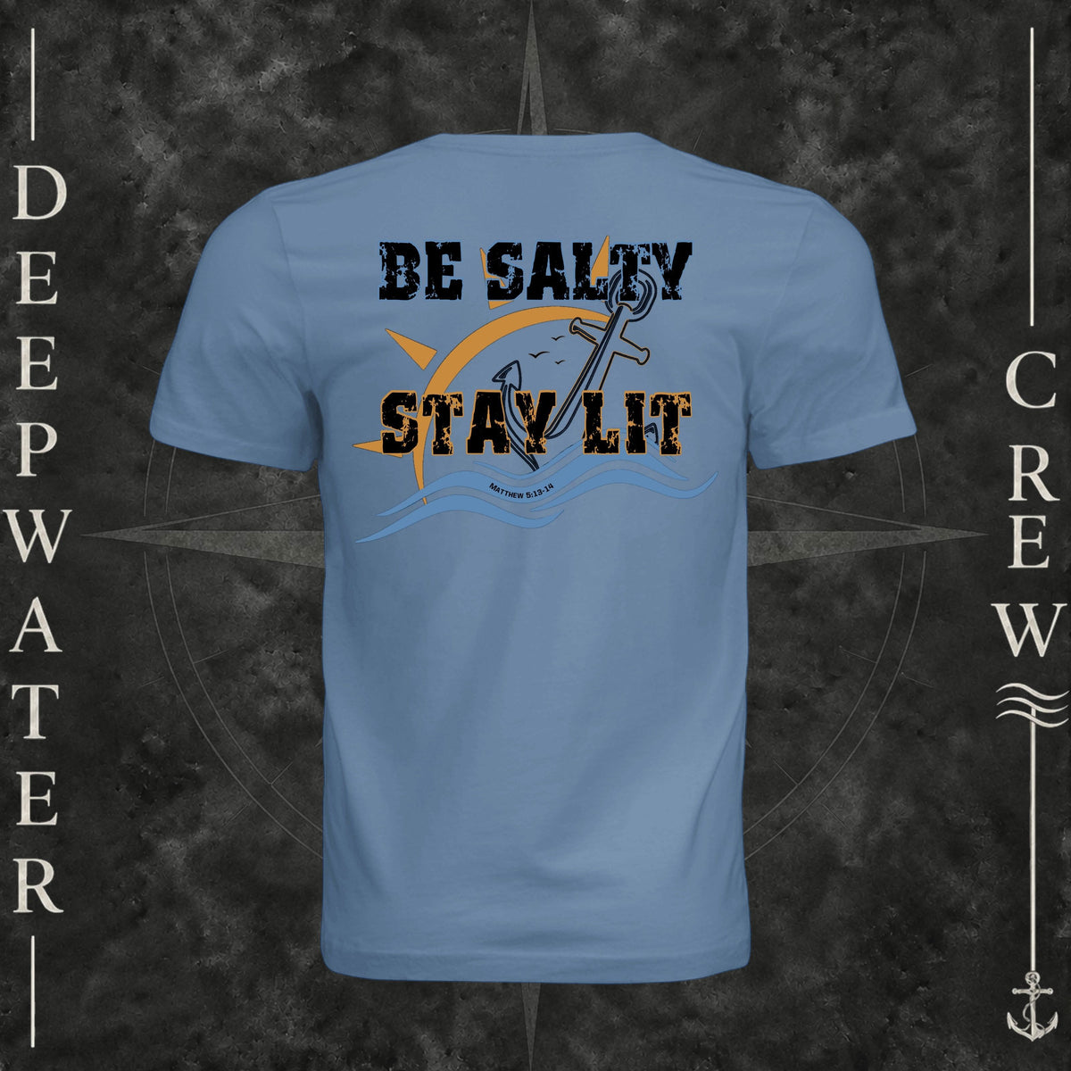 Slate Deepwater Crew Co. Be Salty, Stay Lit crewneck T-shirt, back view with distressed Be Salty, Stay Lit lettering, anchor, sun, blue waves, and Matthew 5:13–14.