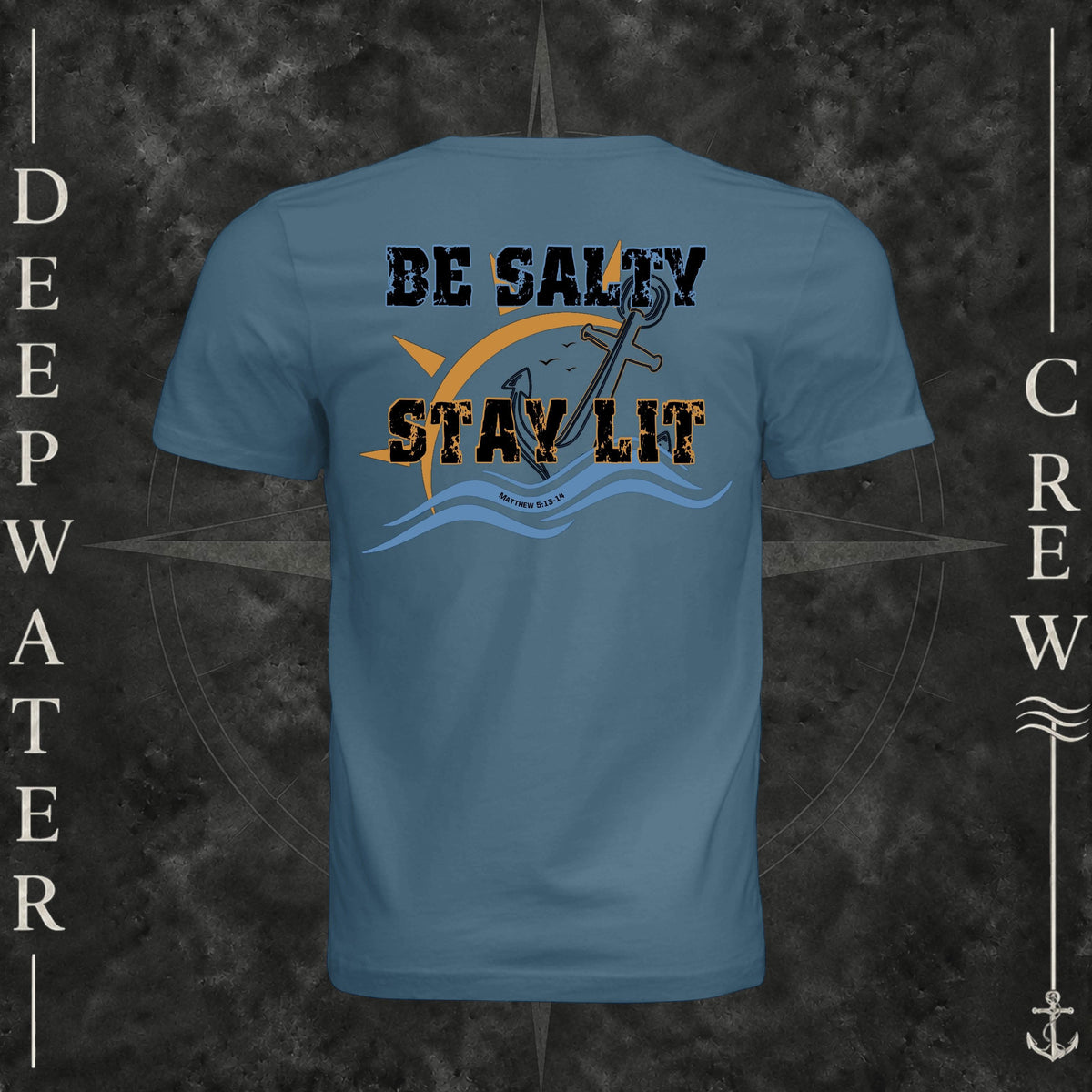 Steel Blue Deepwater Crew Co. Be Salty, Stay Lit crewneck T-shirt, back view with distressed Be Salty, Stay Lit lettering, anchor, sun, blue waves, and Matthew 5:13–14.