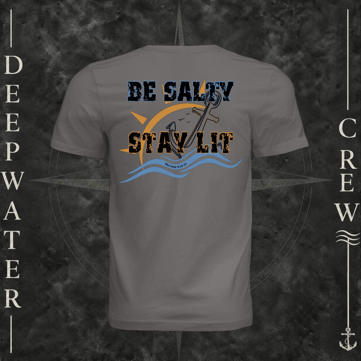 Storm Deepwater Crew Co. Be Salty, Stay Lit crewneck T-shirt, back view with distressed Be Salty, Stay Lit lettering, anchor, sun, blue waves, and Matthew 5:13–14.