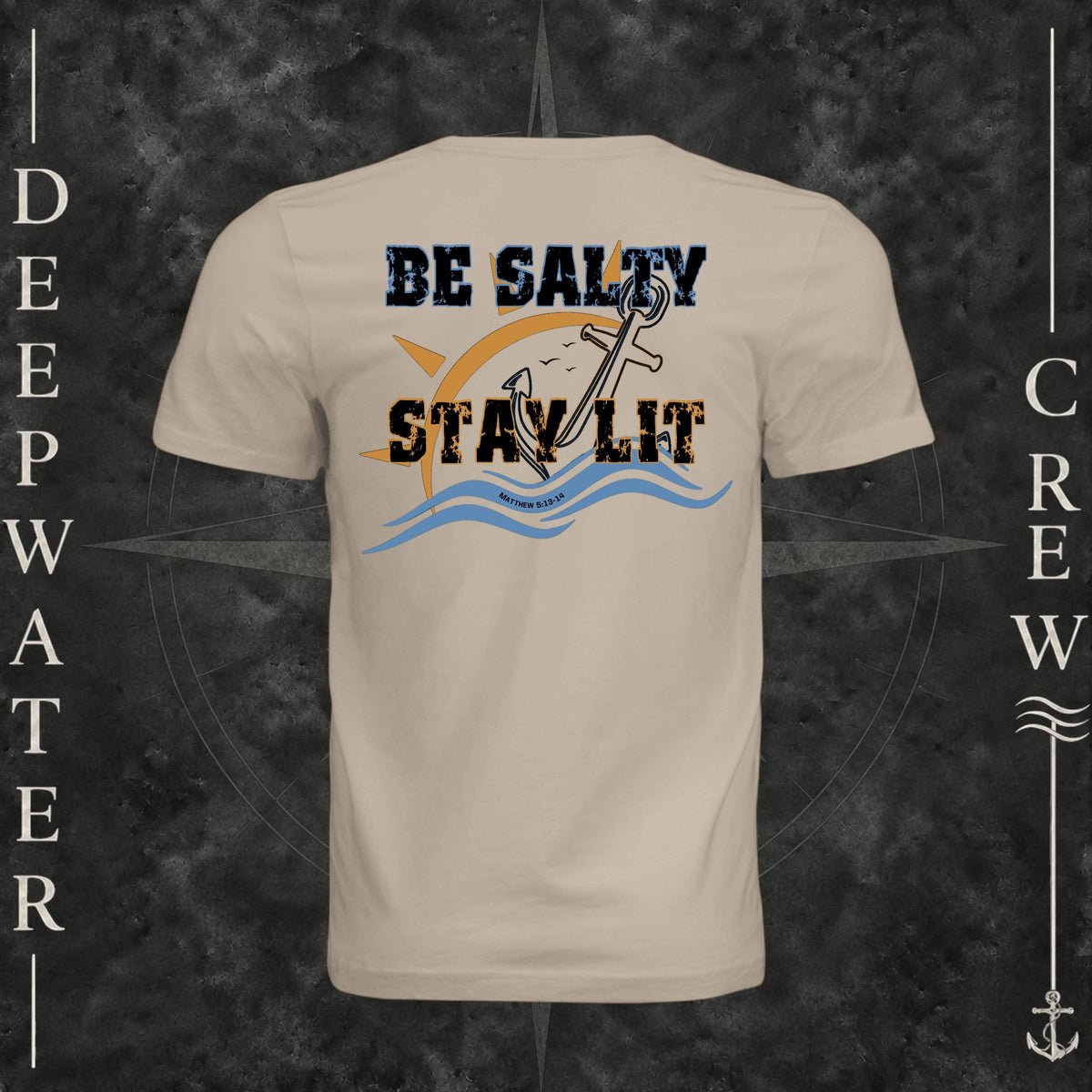 Tan Deepwater Crew Co. Be Salty, Stay Lit crewneck T-shirt, back view with distressed Be Salty, Stay Lit lettering, anchor, sun, blue waves, and Matthew 5:13–14.
