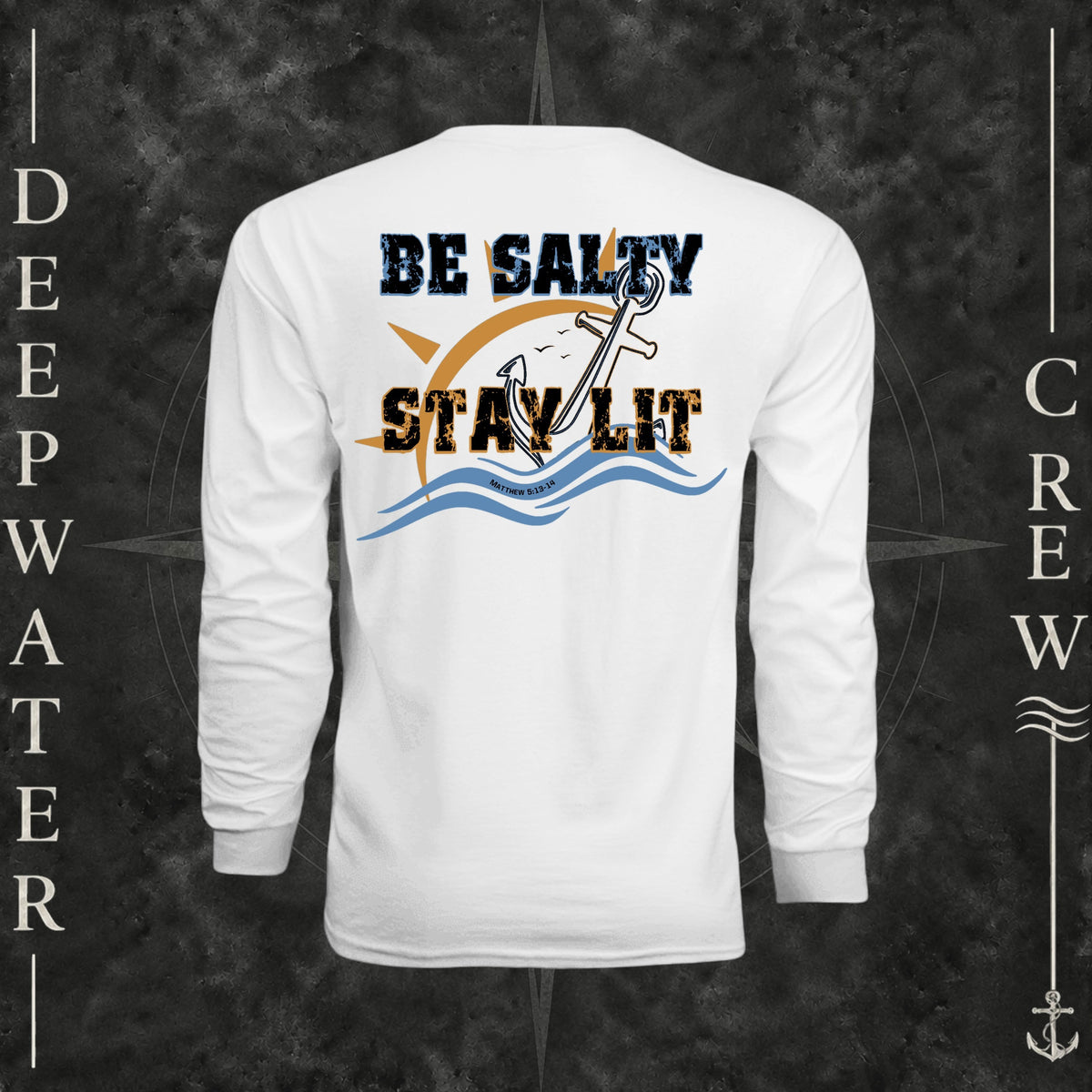 White Deepwater Crew Co. Be Salty, Stay Lit UPF 44+ long-sleeve performance shirt, back view with distressed Be Salty, Stay Lit lettering, anchor, sun, blue waves, subtle cross, and Matthew 5:13–14.