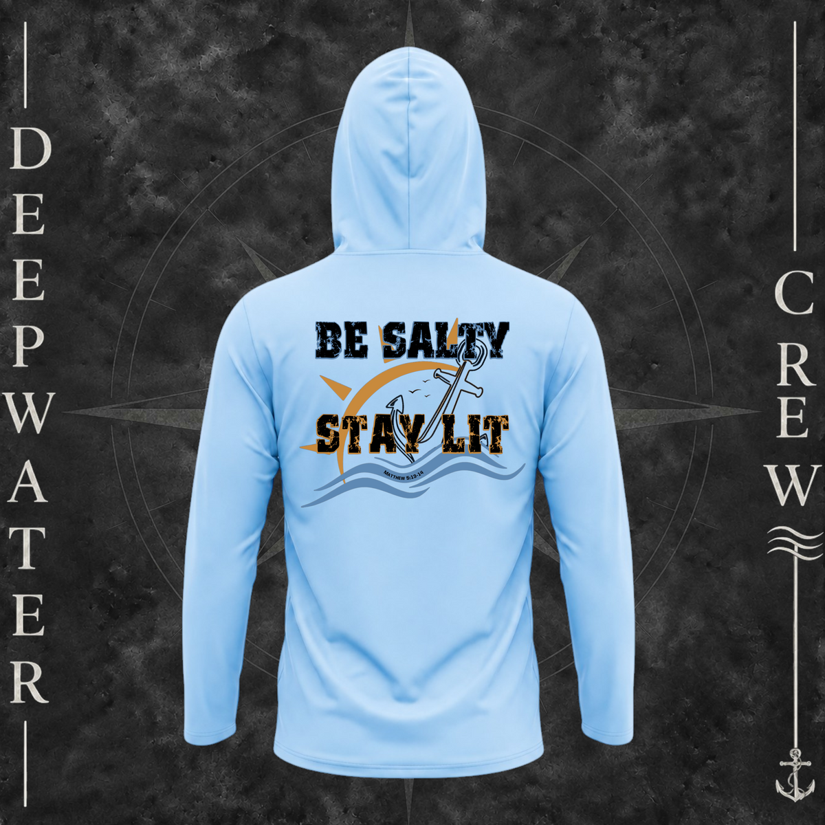 Blue Mist Deepwater Crew Co. Be Salty, Stay Lit UPF 50+ performance hoodie, back view with distressed Be Salty, Stay Lit lettering, anchor, sun, blue waves, subtle cross, and Matthew 5:13–14.