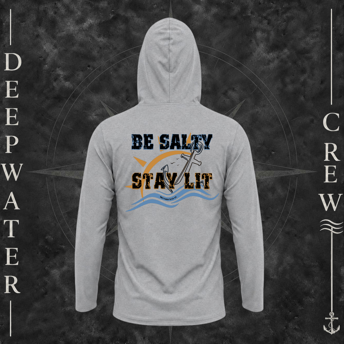 Medium Grey Deepwater Crew Co. Be Salty, Stay Lit UPF 50+ performance hoodie, back view with distressed Be Salty, Stay Lit lettering, anchor, sun, blue waves, subtle cross, and Matthew 5:13–14.