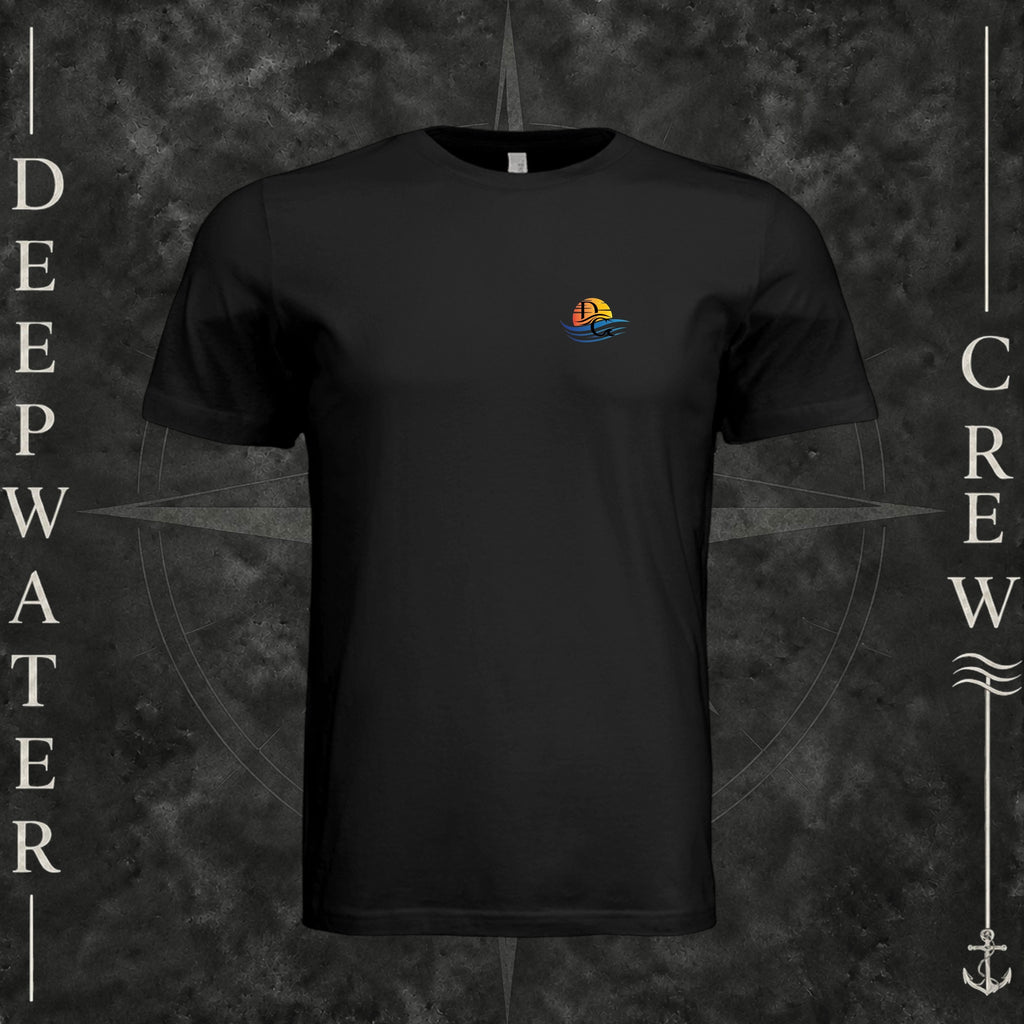 Vintage Black Deepwater Crew Co. Be Salty, Stay Lit crewneck T-shirt, front view with small cross, sunset, and blue-wave crest.