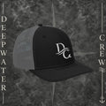 Deepwater Crew Co. black and grey snapback trucker cap with white embroidered wave logo on front panels