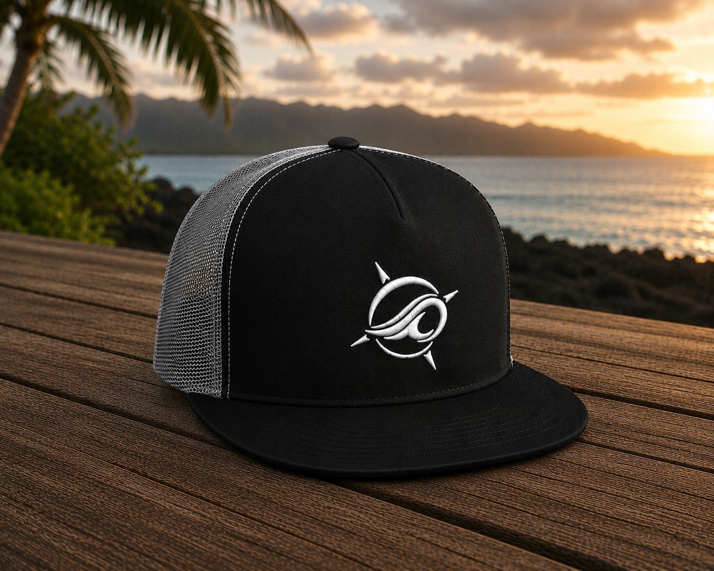 Deepwater Crew Co. black trucker cap with mesh back and embroidered wave compass logo. Flat bill design.