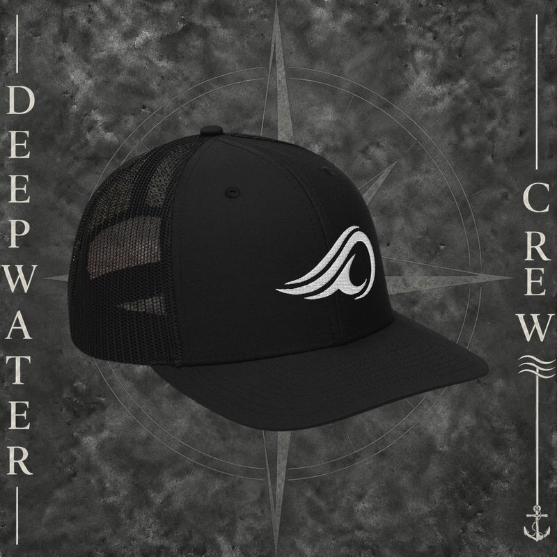 Deepwater Crew Co. black Richardson 112 trucker hat with white embroidered wave logo, breathable mesh back, and structured six-panel design with snapback closure.