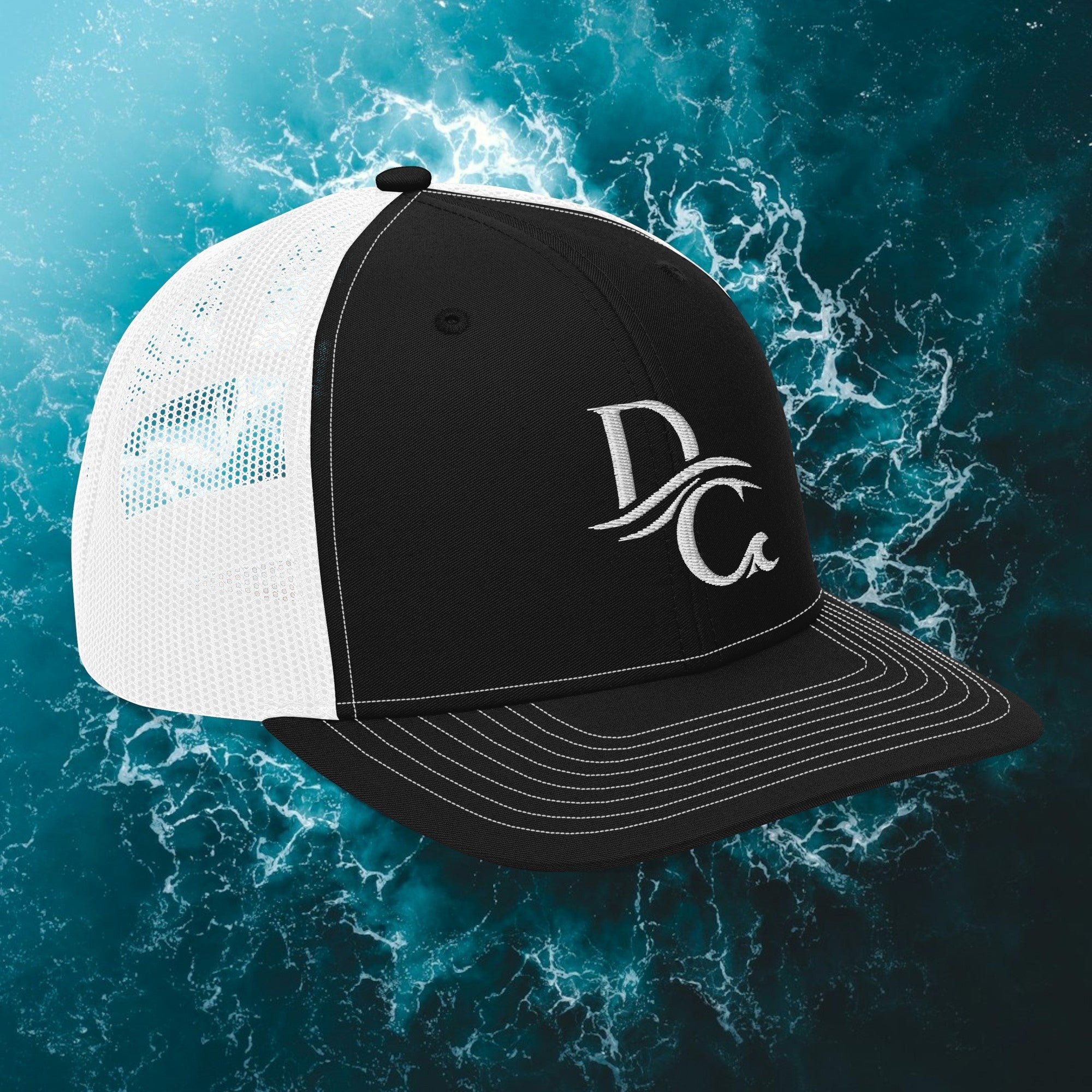 Deepwater Crew Co. black and white trucker hat with embroidered wave logo and breathable mesh back