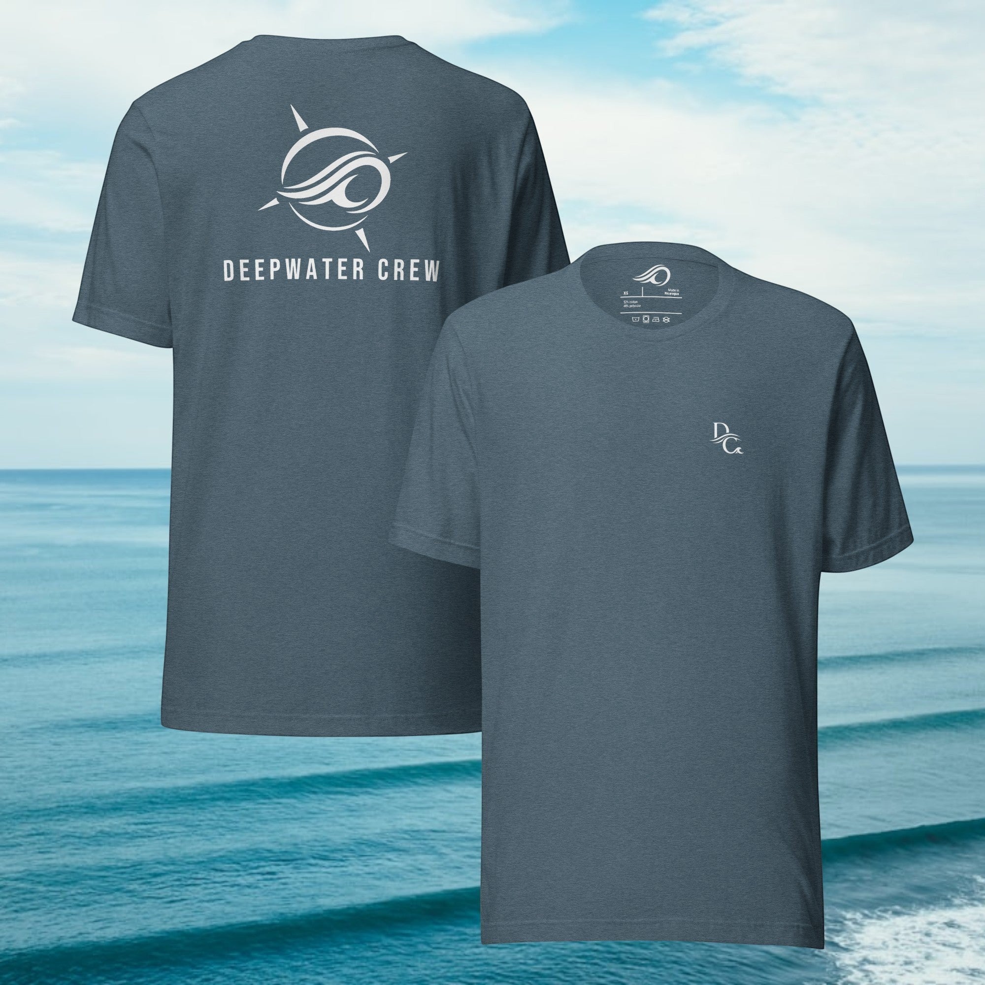 Deepwater Crew Co. dark blue cotton t-shirt featuring a small front logo and large back graphic against an ocean backdrop