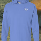Deepwater Crew Co. blue garment-dyed long sleeve hooded t-shirt with white chest logo on a coastal water background