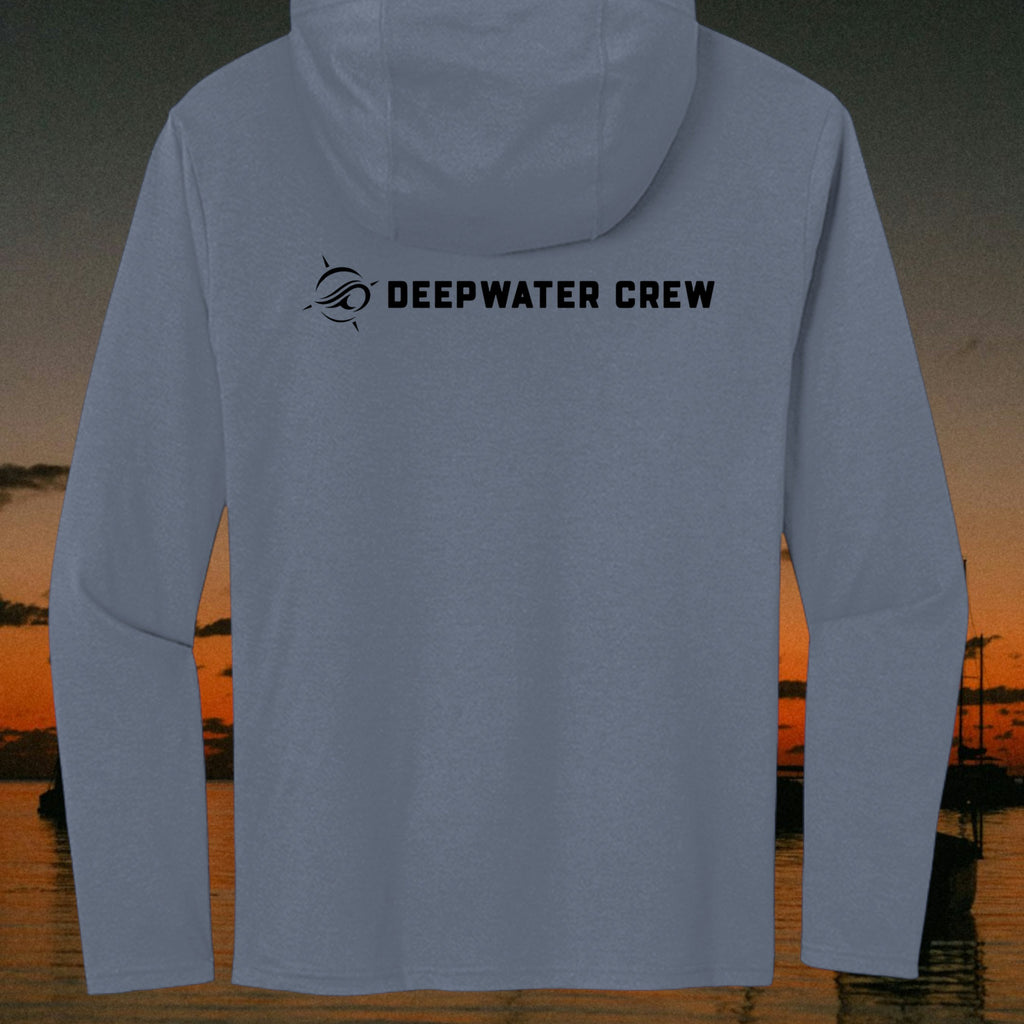 Deepwater Crew Co. blue tri-blend long sleeve hoodie with black logo on the back, set against a sunset coastal scene.