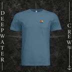 Steel Blue Deepwater Crew Co. Bluewater Strike crewneck T-shirt, front view with small DC sunset and ocean wave chest logo.