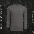 Graphite Deepwater Crew Co. Bluewater Strike UPF 44+ long-sleeve performance shirt, front view with small DC sunset and ocean wave chest logo.