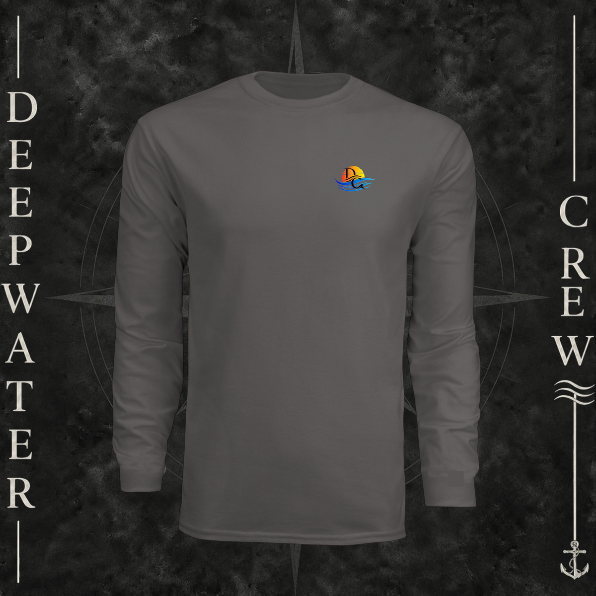 Graphite Deepwater Crew Co. Bluewater Strike UPF 44+ long-sleeve performance shirt, front view with small DC sunset and ocean wave chest logo.