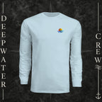 Pastel Blue Deepwater Crew Co. Bluewater Strike UPF 44+ long-sleeve performance shirt, front view with small DC sunset and ocean wave chest logo.
