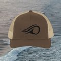 Deepwater Crew Co. brown cotton-polyester blend trucker hat with black wave logo and tan mesh back.