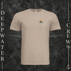 Dust Deepwater Crew Co. Called to Fish crewneck T-shirt, front view with small sunset-and-wave crest with DC logo.