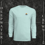 Pastel Mint Deepwater Crew Co. Called to Fish UPF 44+ long-sleeve performance shirt, front view with small sunset-and-wave crest with DC logo.