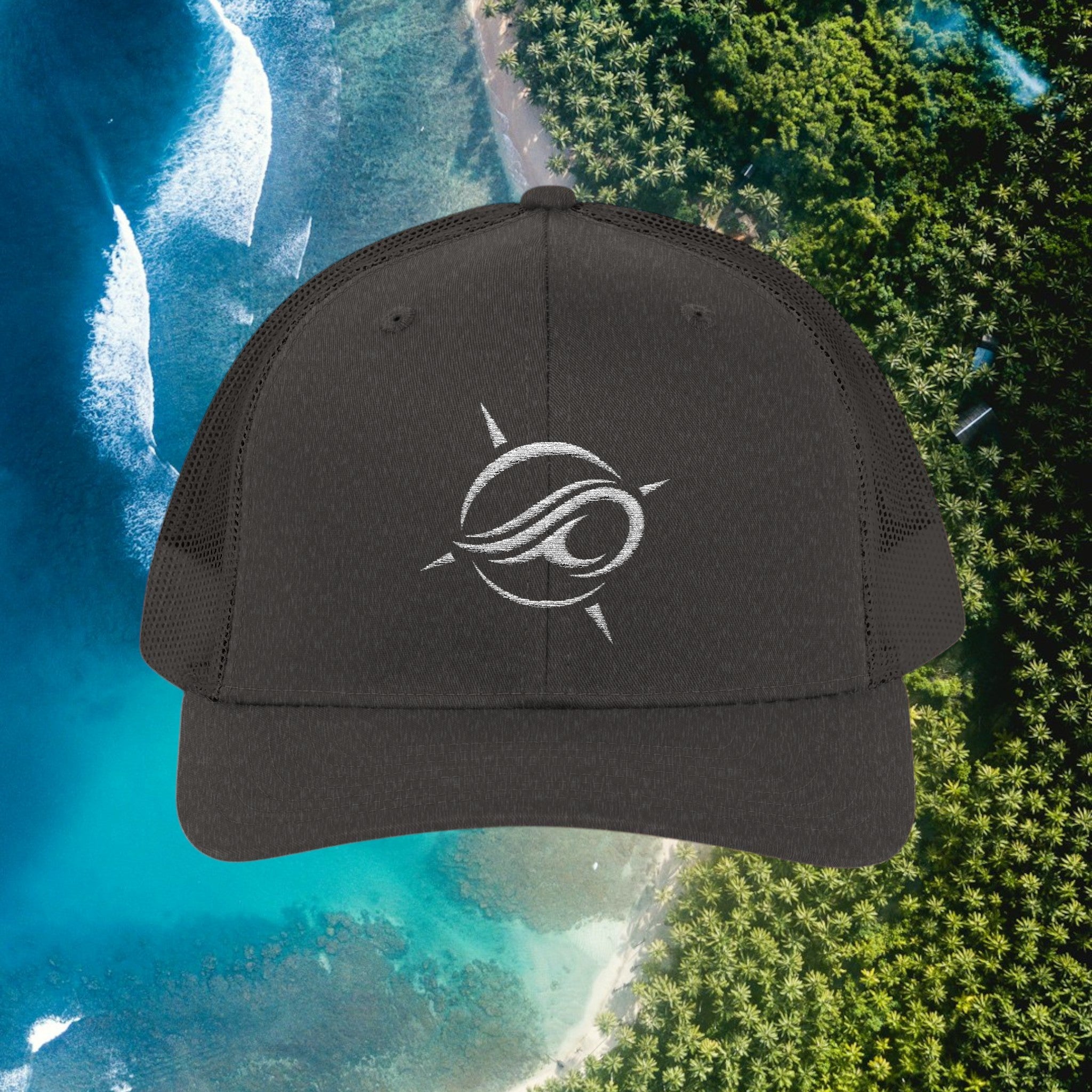 Deepwater Crew Co. dark grey trucker hat with white embroidered wave logo, mesh back, and adjustable snapback closure.