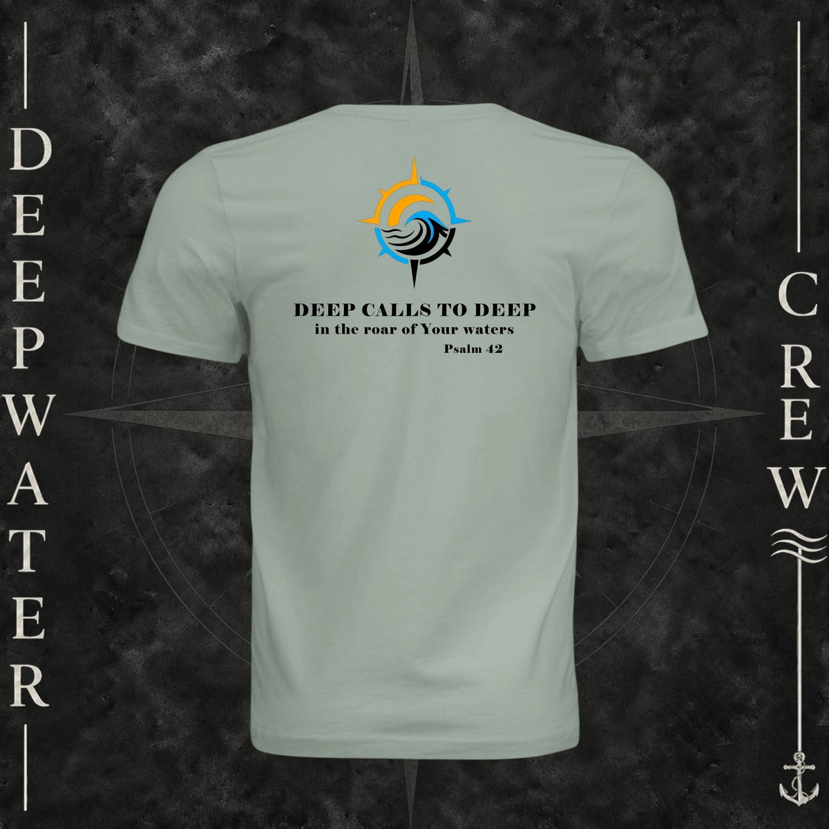 Dusty Blue Deepwater Crew Co. Deep 2 Deep crewneck T-shirt, back view with compass, ocean wave and sun graphic featuring the “Deep Calls to Deep” Psalm 42 scripture design.