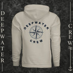 Cement Deepwater Crew Co. Deepwater Nomad Heavy Fleece Hoodie, back view with large distressed compass rose graphic and Deepwater Crew lettering.
