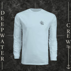 Pastel Blue Deepwater Crew Co. Deepwater Nomad UPF 44+ long-sleeve performance shirt, front view with small DC compass crest chest logo.