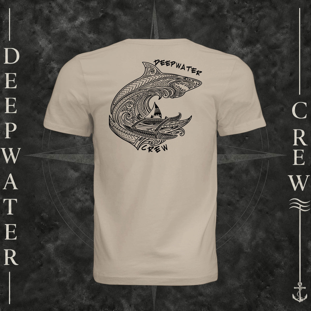 Tan Deepwater Crew Co. Deepwater Passage crewneck T-shirt, back view with large patterned shark, outrigger canoe and ocean wave graphic with Deepwater Crew lettering.