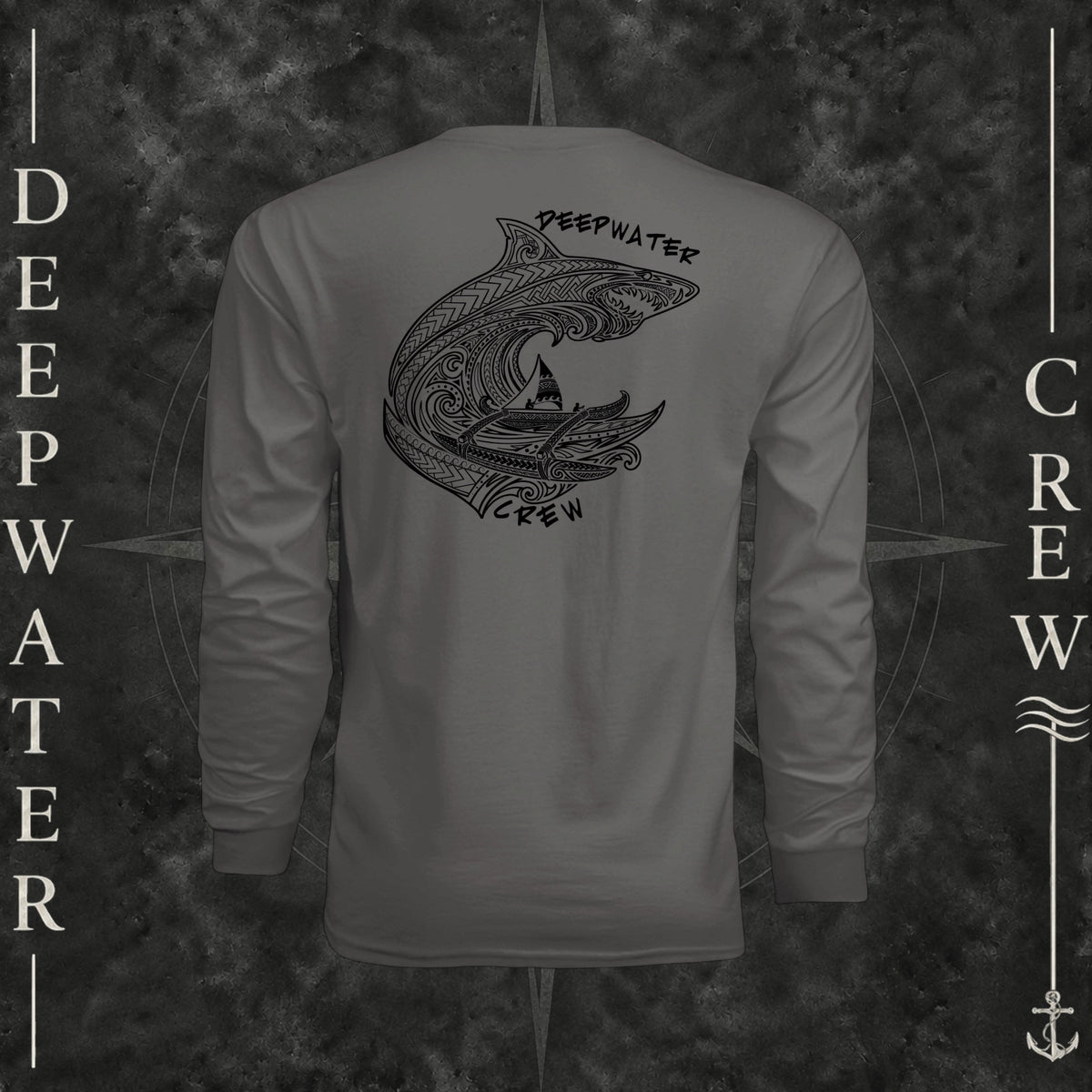 Graphite Deepwater Crew Co. Deepwater Passage UPF 44+ long-sleeve performance shirt, back view with large patterned shark, outrigger canoe and ocean wave graphic with Deepwater Crew lettering.