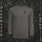 Graphite Deepwater Crew Co. Deepwater Passage UPF 44+ long-sleeve performance shirt, front view with small DC wave crest chest logo.