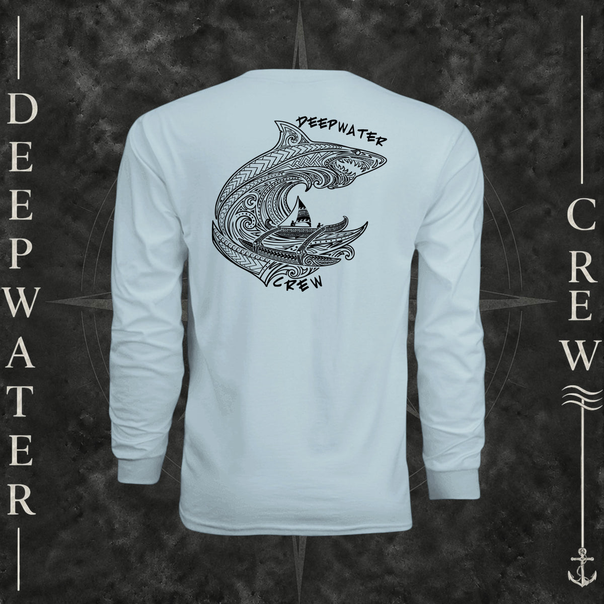 Pastel Blue Deepwater Crew Co. Deepwater Passage UPF 44+ long-sleeve performance shirt, back view with large patterned shark, outrigger canoe and ocean wave graphic with Deepwater Crew lettering.