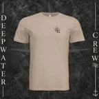 Dust Deepwater Crew Co. Fast & Free crewneck T-shirt, front view with small DC compass crest chest logo.