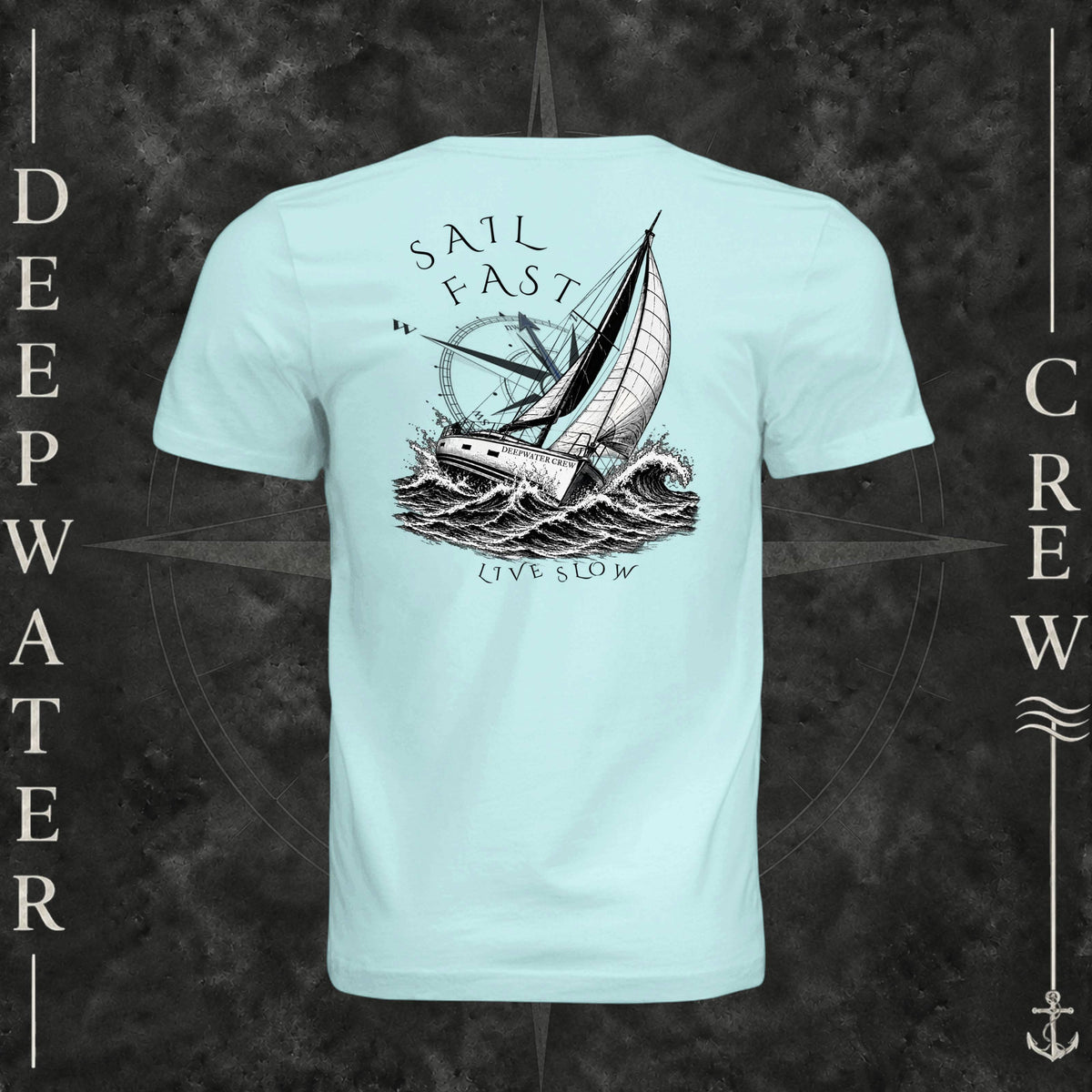 Mint Deepwater Crew Co. Fast & Free crewneck T-shirt, back view with large sailboat, ocean wave and compass graphic featuring “Sail Fast Live Slow” lettering.