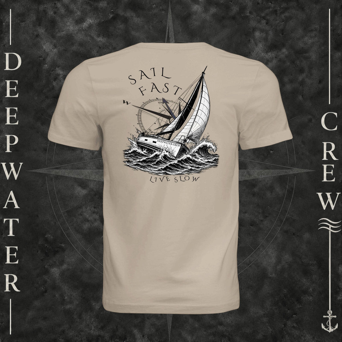 Tan Deepwater Crew Co. Fast & Free crewneck T-shirt, back view with large sailboat, ocean wave and compass graphic featuring “Sail Fast Live Slow” lettering.