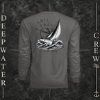 Graphite Deepwater Crew Co. Fast & Free UPF 44+ long-sleeve performance shirt, back view with large sailboat, ocean wave and compass graphic featuring “Sail Fast Live Slow” lettering.