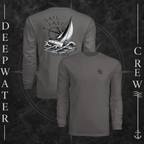 Graphite Deepwater Crew Co. Fast & Free UPF 44+ long-sleeve performance shirt showing front and back views, with small DC compass chest logo and large sailboat, ocean wave, and compass graphic featuring “Sail Fast Live Slow” lettering.