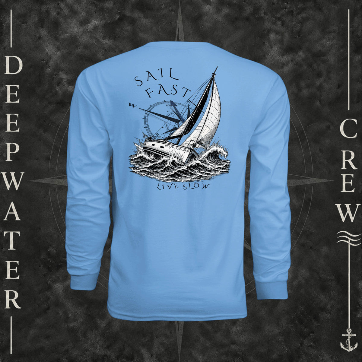 Light Blue Deepwater Crew Co. Fast & Free UPF 44+ long-sleeve performance shirt, back view with large sailboat, ocean wave and compass graphic featuring “Sail Fast Live Slow” lettering.