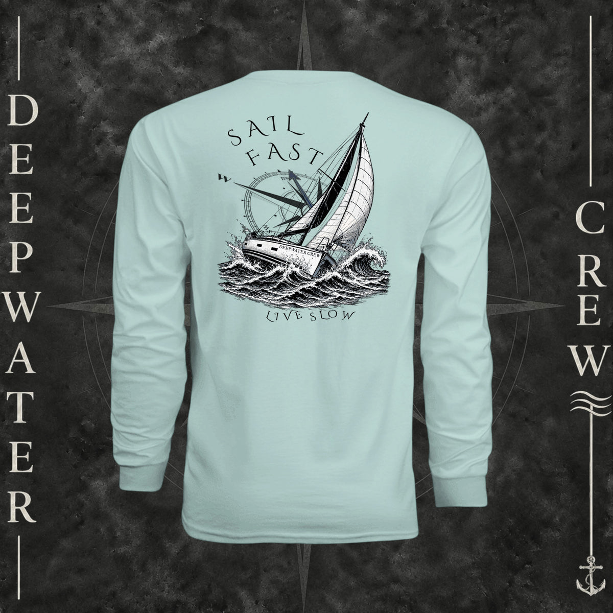 Pastel Mint Deepwater Crew Co. Fast & Free UPF 44+ long-sleeve performance shirt, back view with large sailboat, ocean wave and compass graphic featuring “Sail Fast Live Slow” lettering.