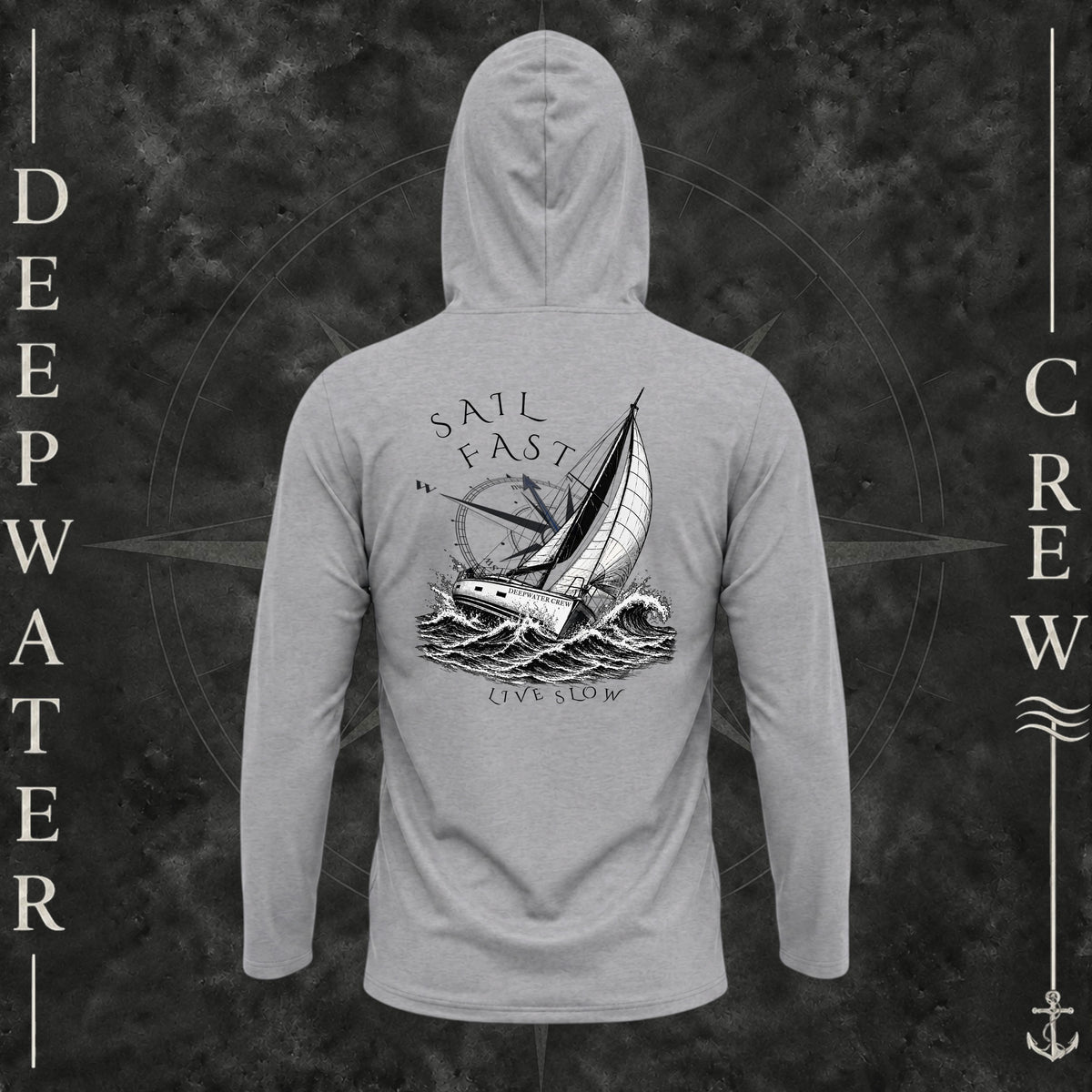 Heather Grey Deepwater Crew Co. Fast & Free UPF 30 performance hoodie, back view with large sailboat, ocean wave and compass graphic featuring “Sail Fast Live Slow” lettering.