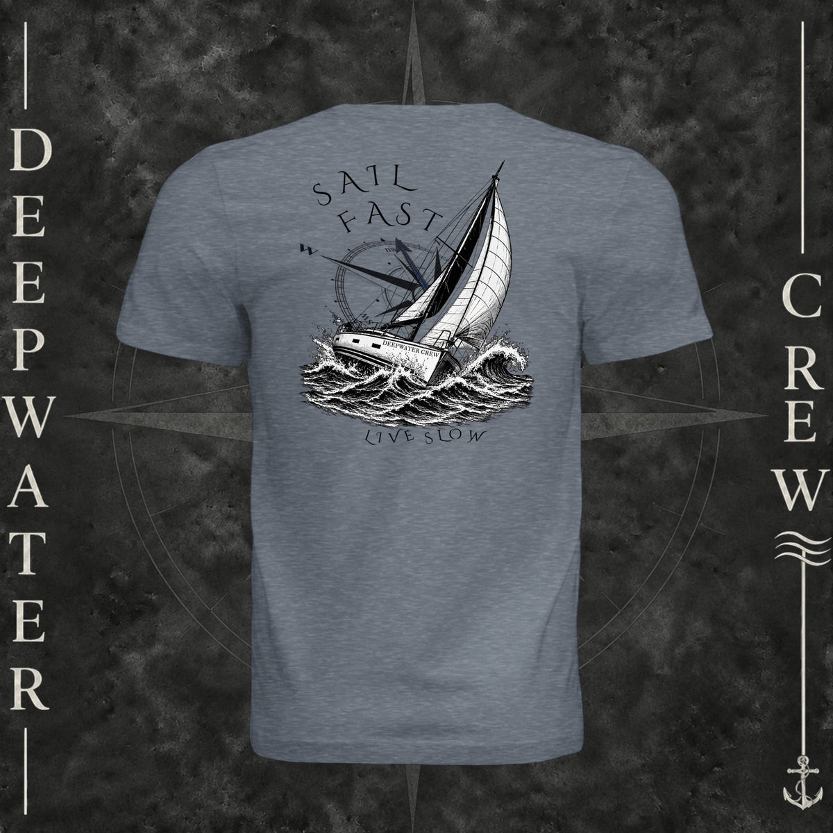 Vintage Denim Deepwater Crew Co. Fast & Free crewneck T-shirt, back view with large sailboat, ocean wave and compass graphic featuring “Sail Fast Live Slow” lettering.
