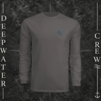 Graphite Deepwater Crew Co. Forged of Salt UPF 44+ long-sleeve performance shirt, front view with small blue-outlined DC compass-and-wave crest logo.