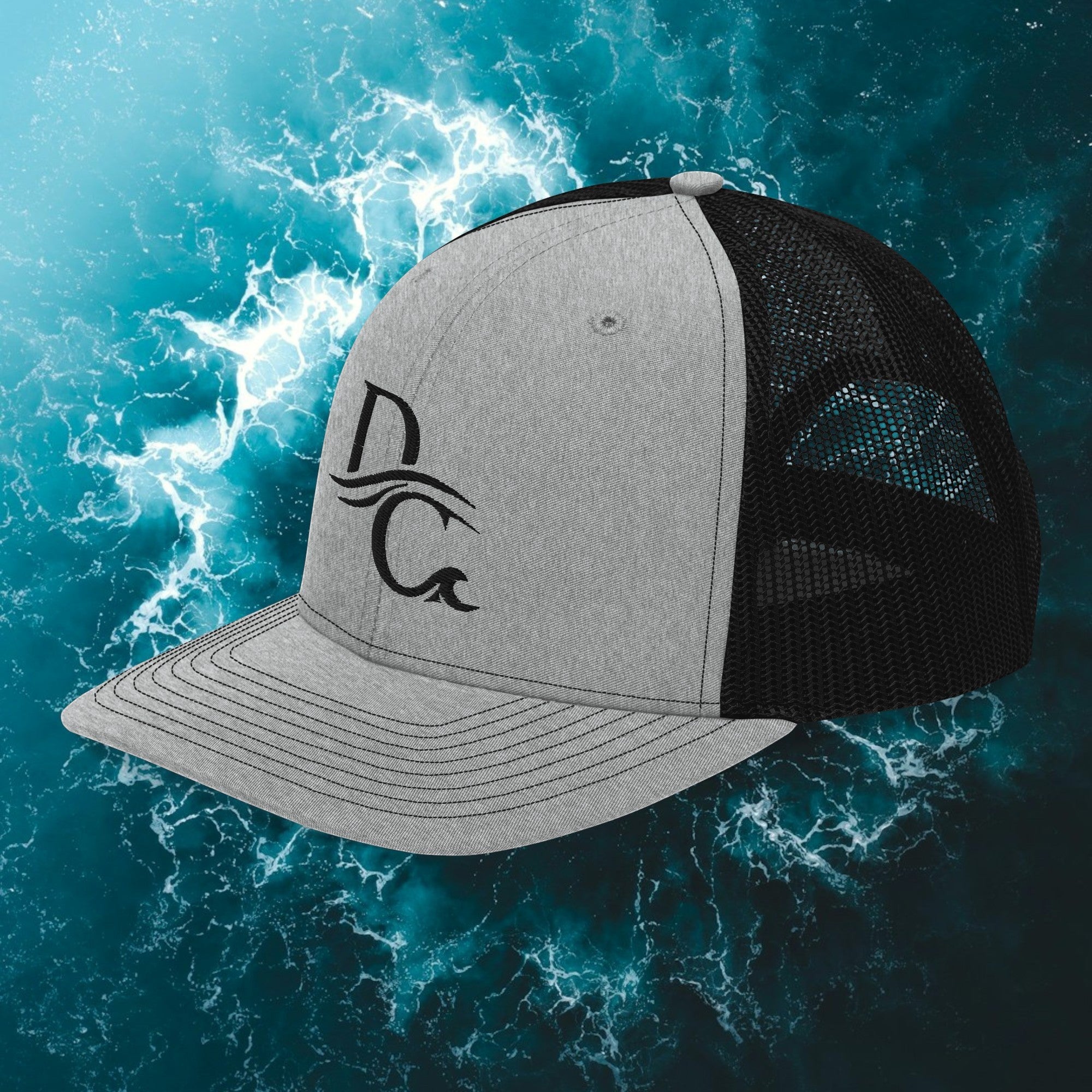 Deepwater Crew Co. grey and black snapback trucker cap with embroidered wave logo and breathable mesh back